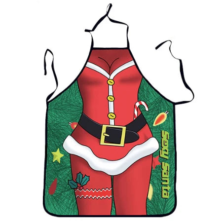 tablier de cuisine femme Noël devant un sapin avec lumiere